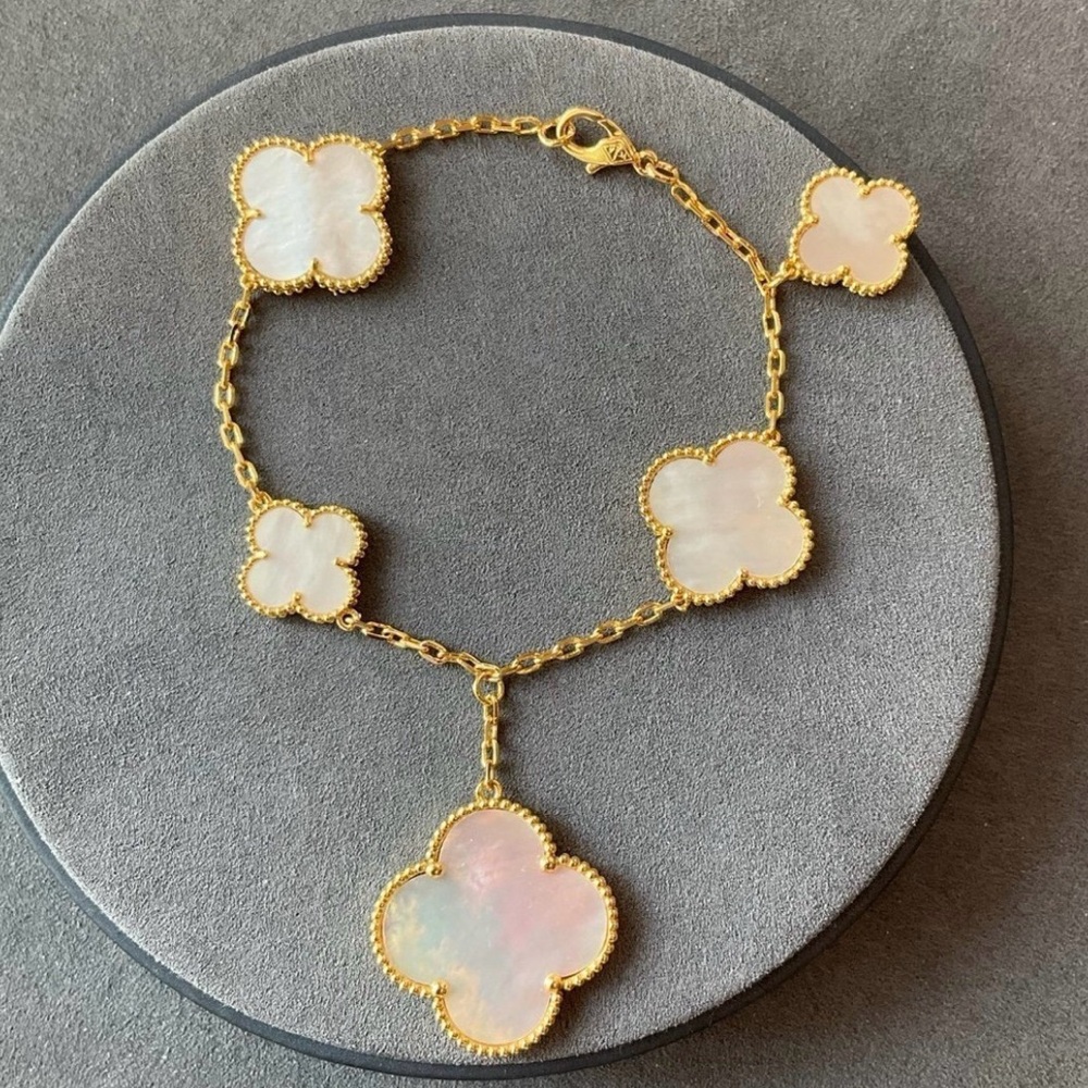 Elegant Gold and White Clover Bracelet